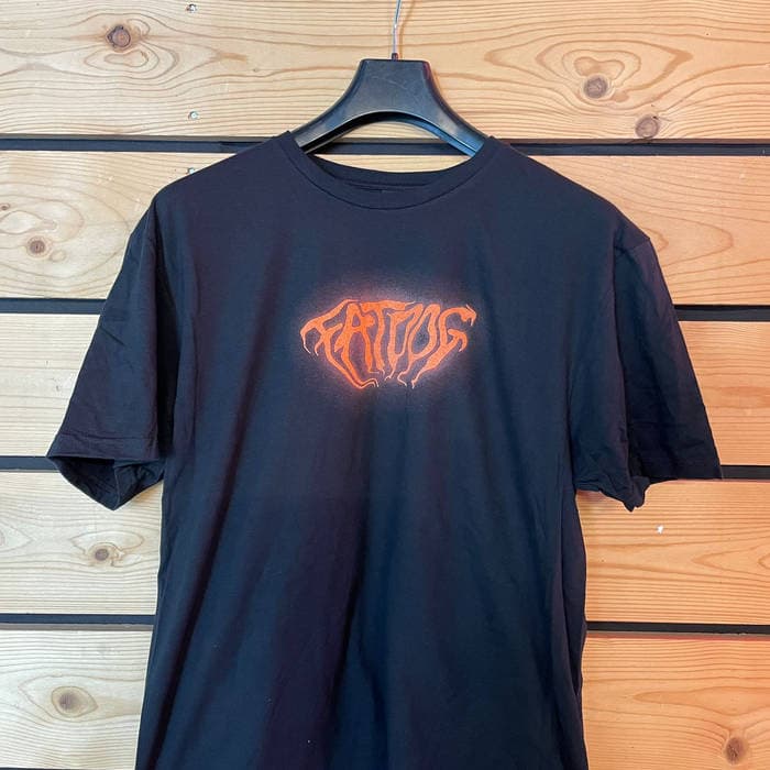 Glowing red logo T