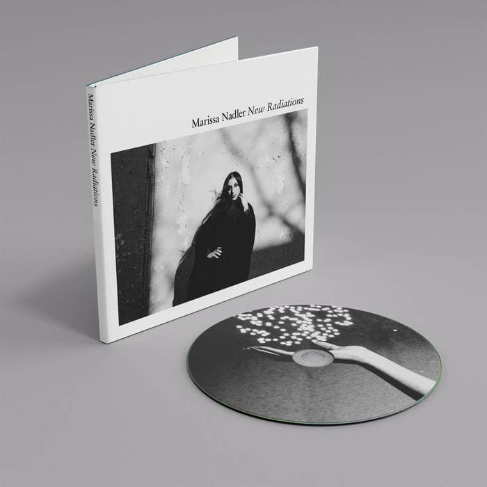 New Radiations – CD + Signed Postcard