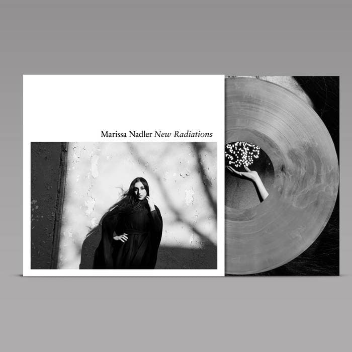 New Radiations – 140g Smoky Grey Marble LP + Signed Postcard