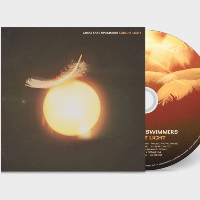 Caught Light – Compact Disc.