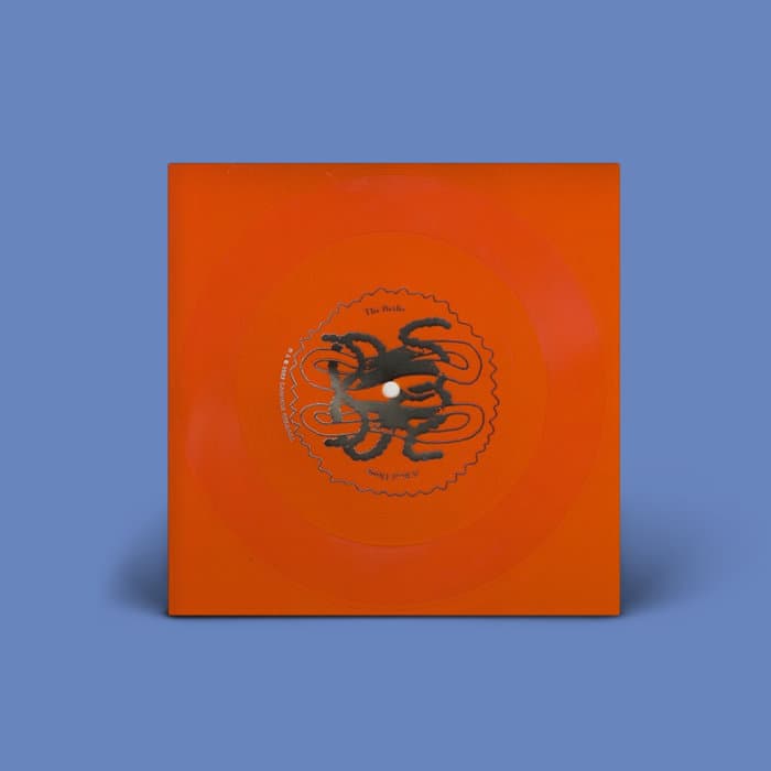 Expert In A Dying Field (Deluxe) – "A Real Thing" - limited edition 7" flexi