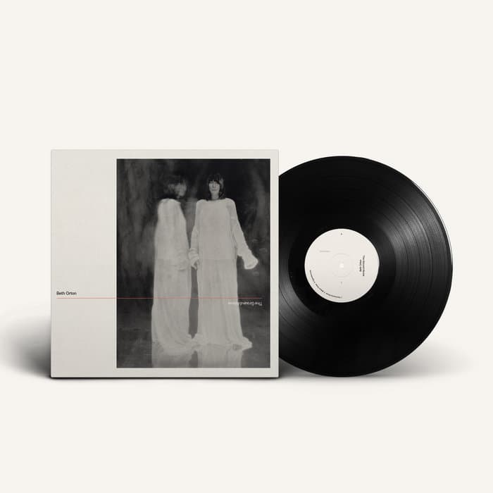The Ground Above – LP, pressed on black vinyl, housed in a single sleeve jacket with printed inner sleeve, featuring credits and lyrics.